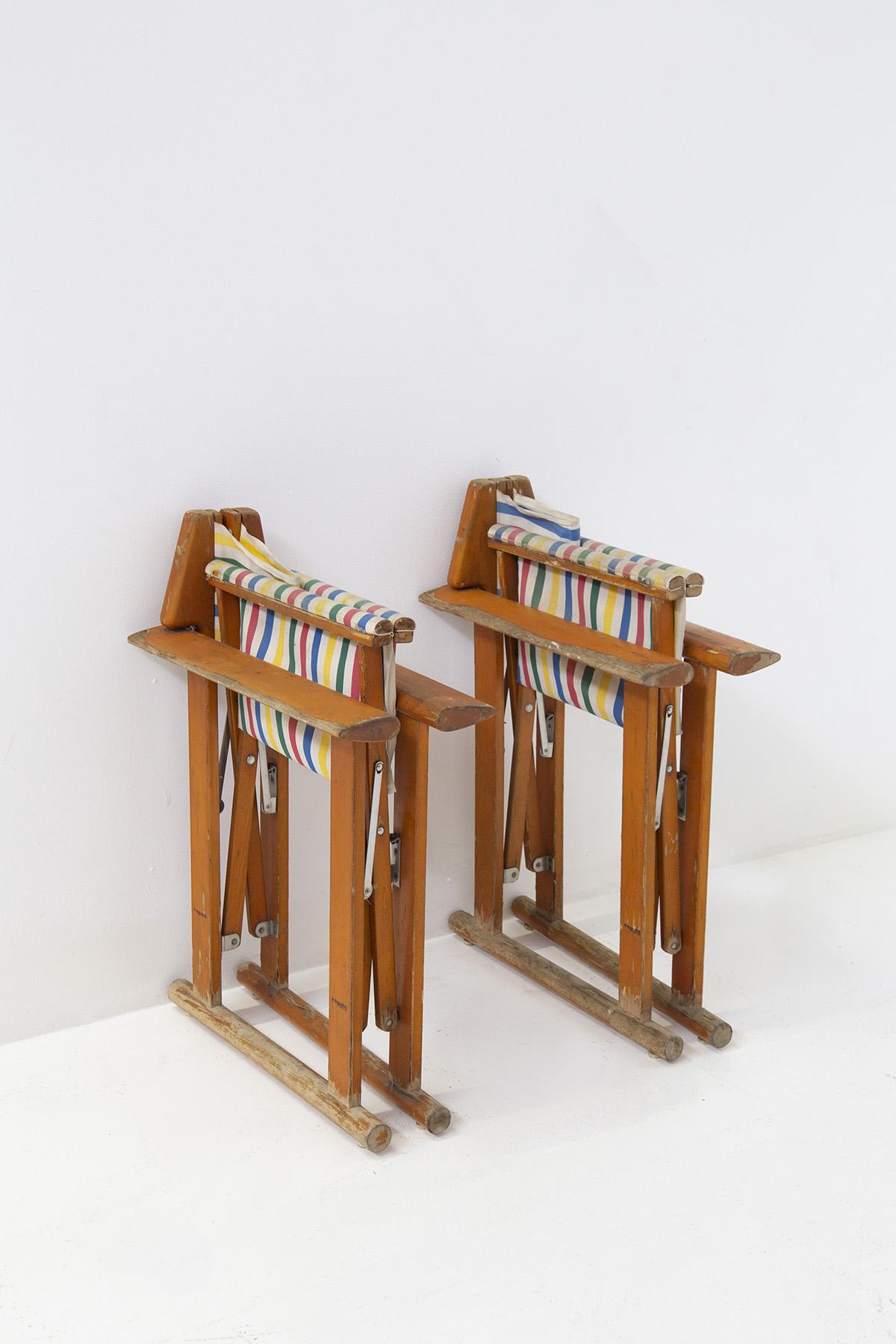Gorgeous Regguiti-branded folding Safari armchairs from the 1970s, Italian manufacture.
The chairs are made in the wooden frame, the legs are 4, which join on the floor in a cylindrical wooden slat, in original patina, a sight.
In the middle of