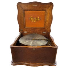 Antique Regina Disc Music Box with Serpentine Case, circa 1899 & 10 Discs
