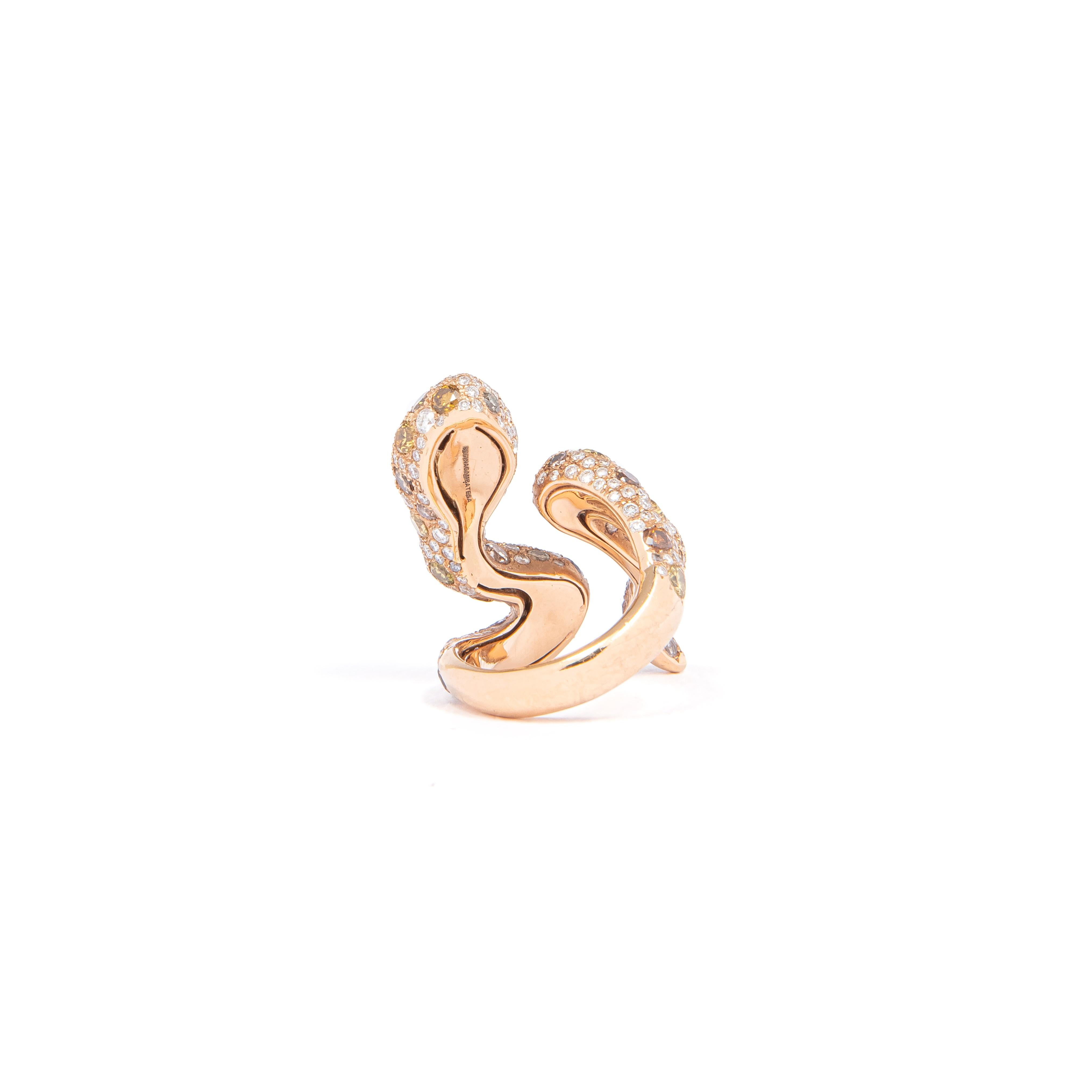 Amazing Snake ring in pink and gray gold with brilliant cut diamonds ct. 3,29, fancy diamonds ct. 5.13. The snake ring by Regina Gambatesa was createdin 1997 and it soon had an extraordinary success in Italy. This is a timeless one of a kind piece .