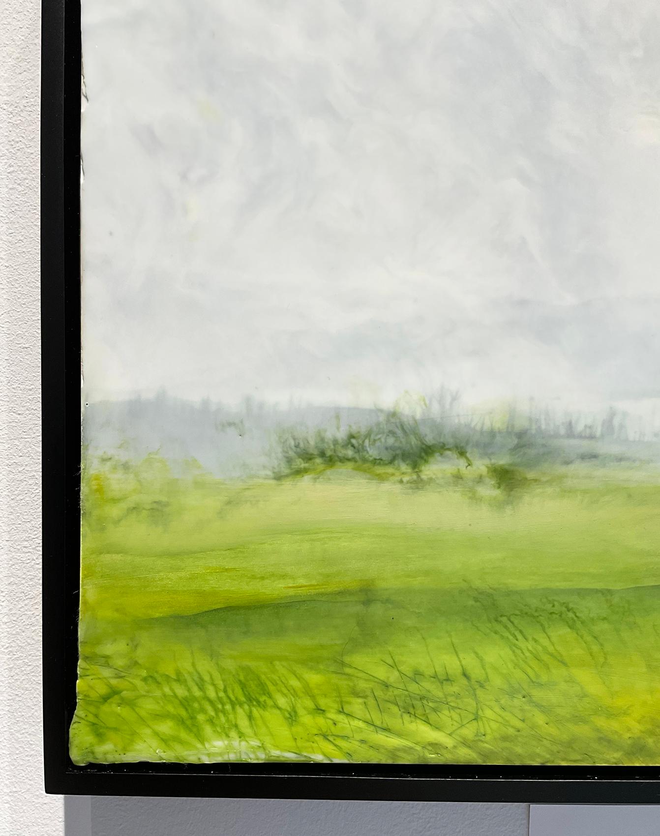 Impressionist style encaustic painting of a quaint country landscape with green fields and distant grey skies and mountains 
