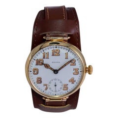 Antique Regina Yellow Gold Filled Art Deco Campaign Style from 1915 with Enamel Dial