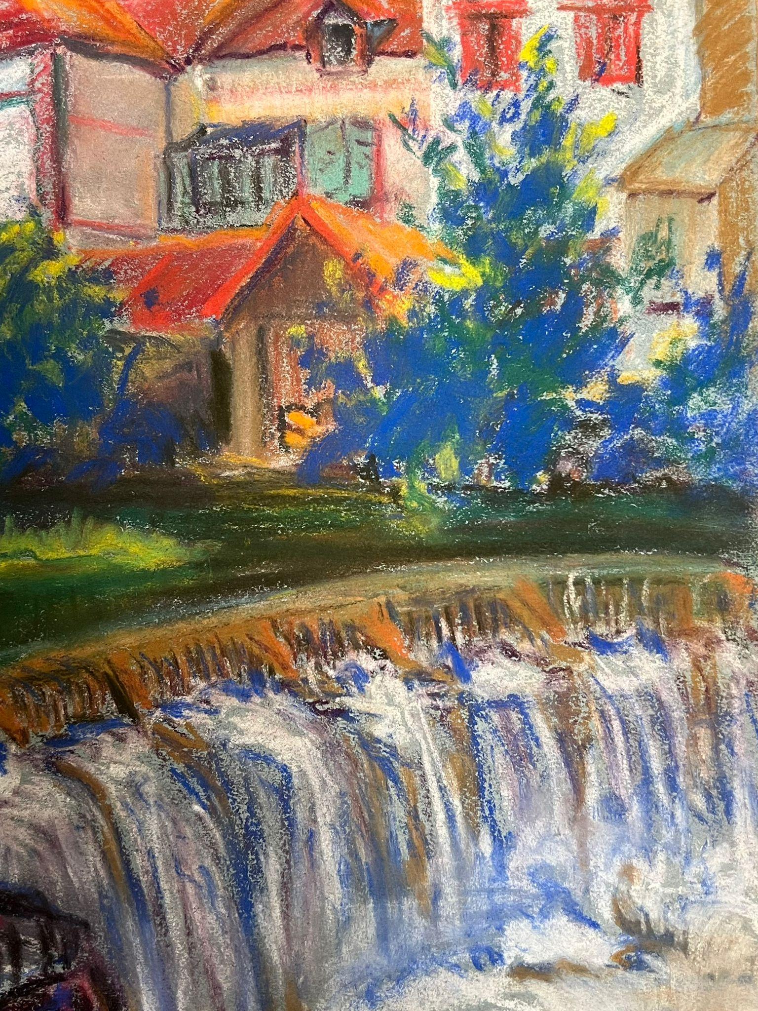 Colorful Village Landscape with Red-Roofed Houses and Flowing Waterfall - Post-Impressionist Painting by Regine David