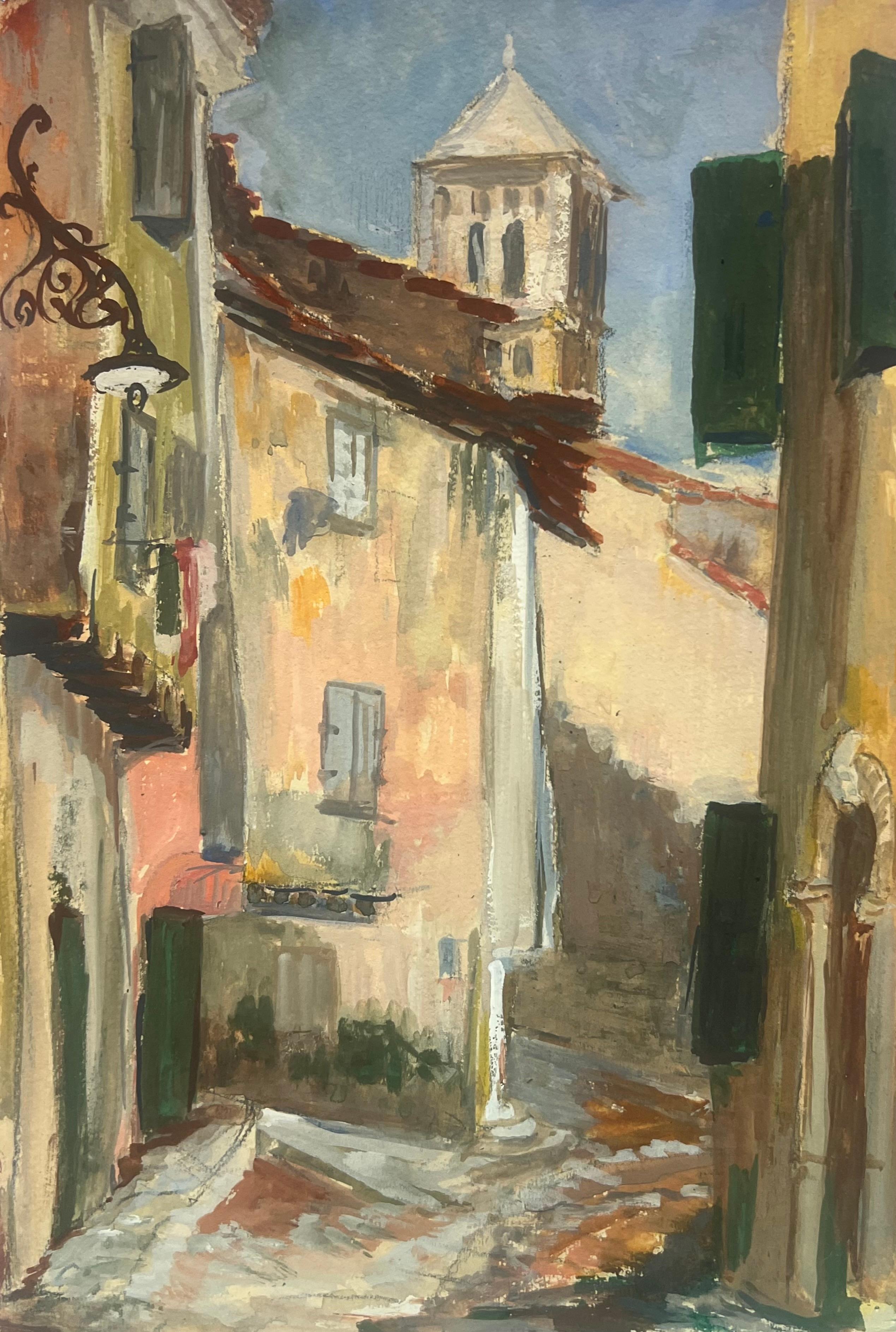 Landscape Painting de Regine David - Escena de calle de pueblo francés con torre y ventanas enrejadas
