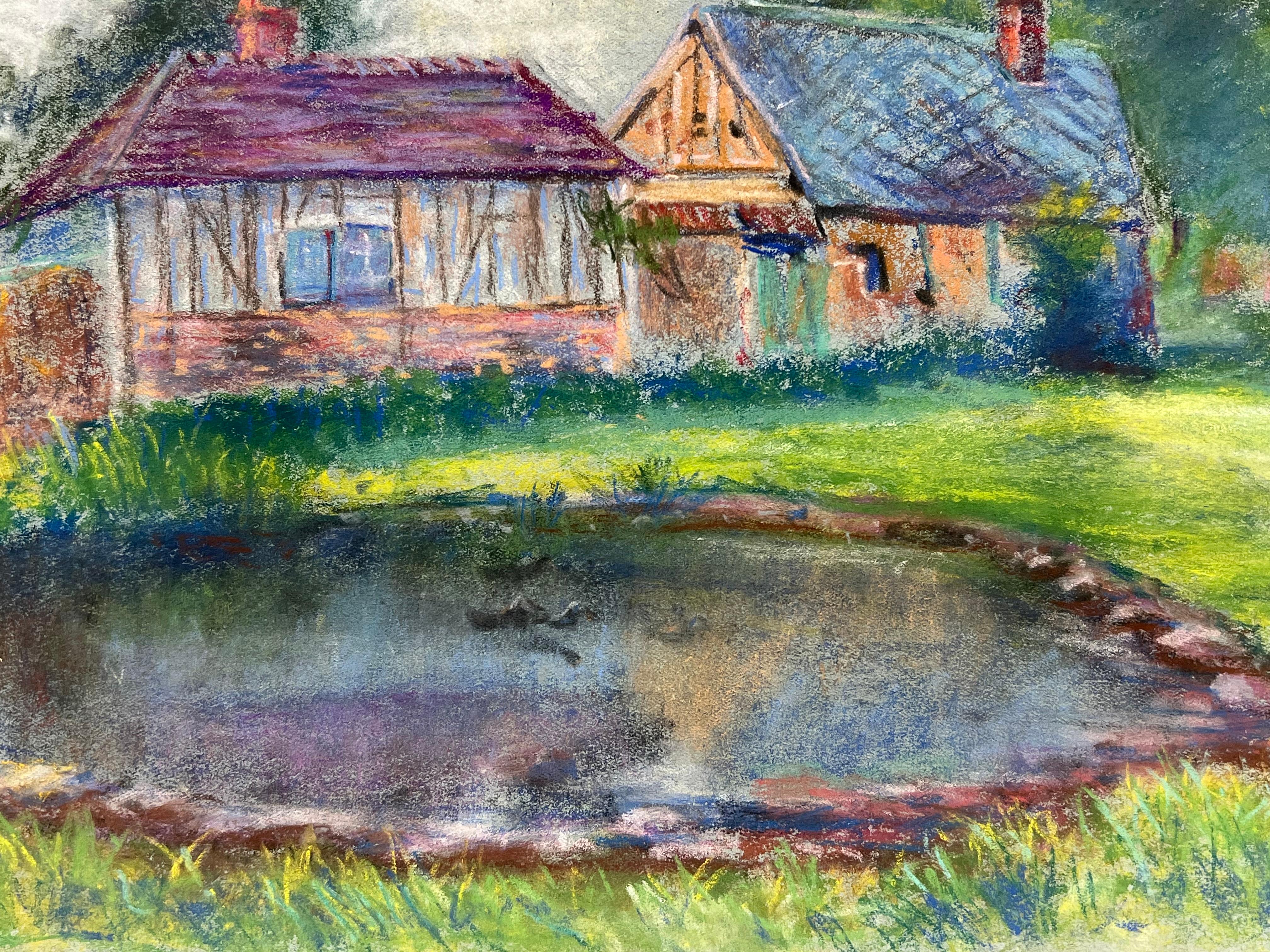 Cottages by a Pond
by Regine David (female French artist, 1910-2018)
pastel painting on artist paper
painting: 11 x 15 inches
inscribed verso
condition: This painting is in excellent condition, with vibrant colors and well-preserved details. The
