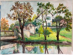 Reflektionen von Home A Tranquil Countryside Scene by the Water's Edge