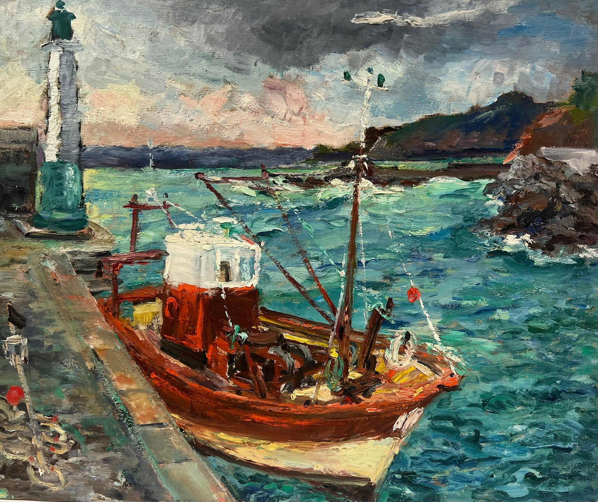 Landscape Painting de Regine David - Vibrante escena costera de un barco pesquero atracado junto a un faro Paisaje francés