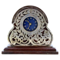 Regulator clock in rosewood with cut silver applications