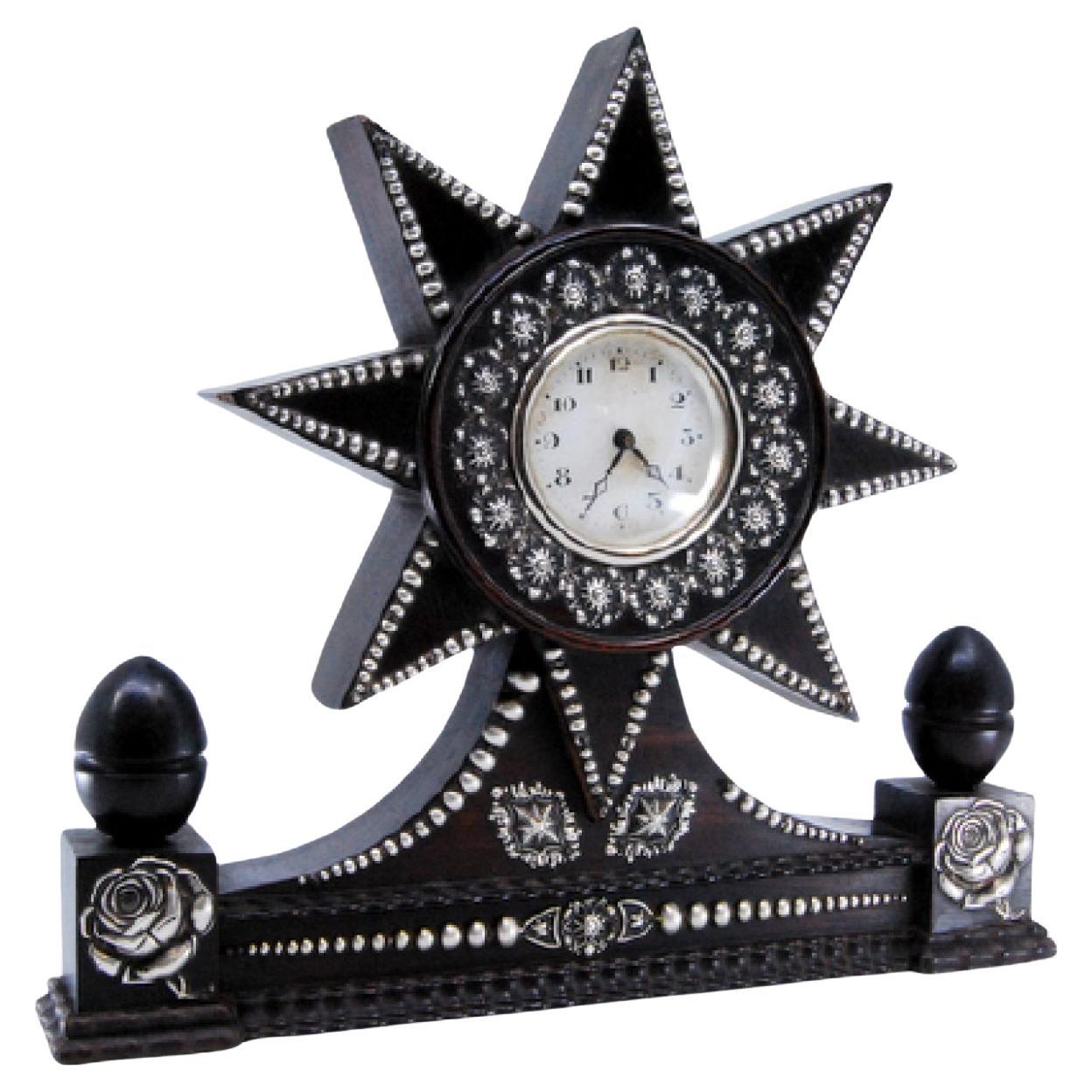 Regulator clock in rosewood with silver applications