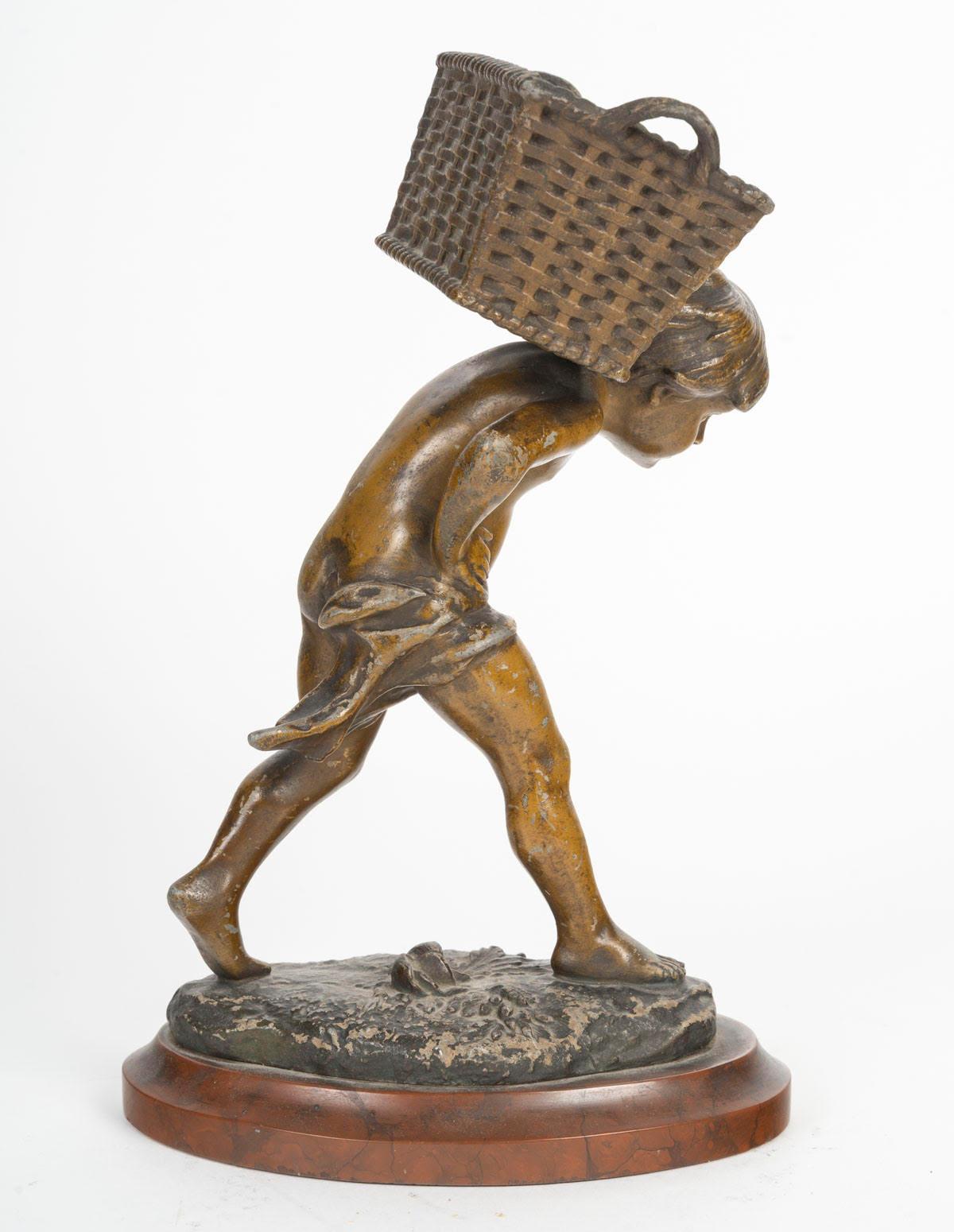 Scultura Regule, base in marmo Griotte, XIX secolo, periodo Napoleone III.

Scultura di un bambino con cesto, XIX secolo, periodo Napoleone III, base in marmo color ciliegio.
H: 27cm, L: 19cm, P: 11cm

