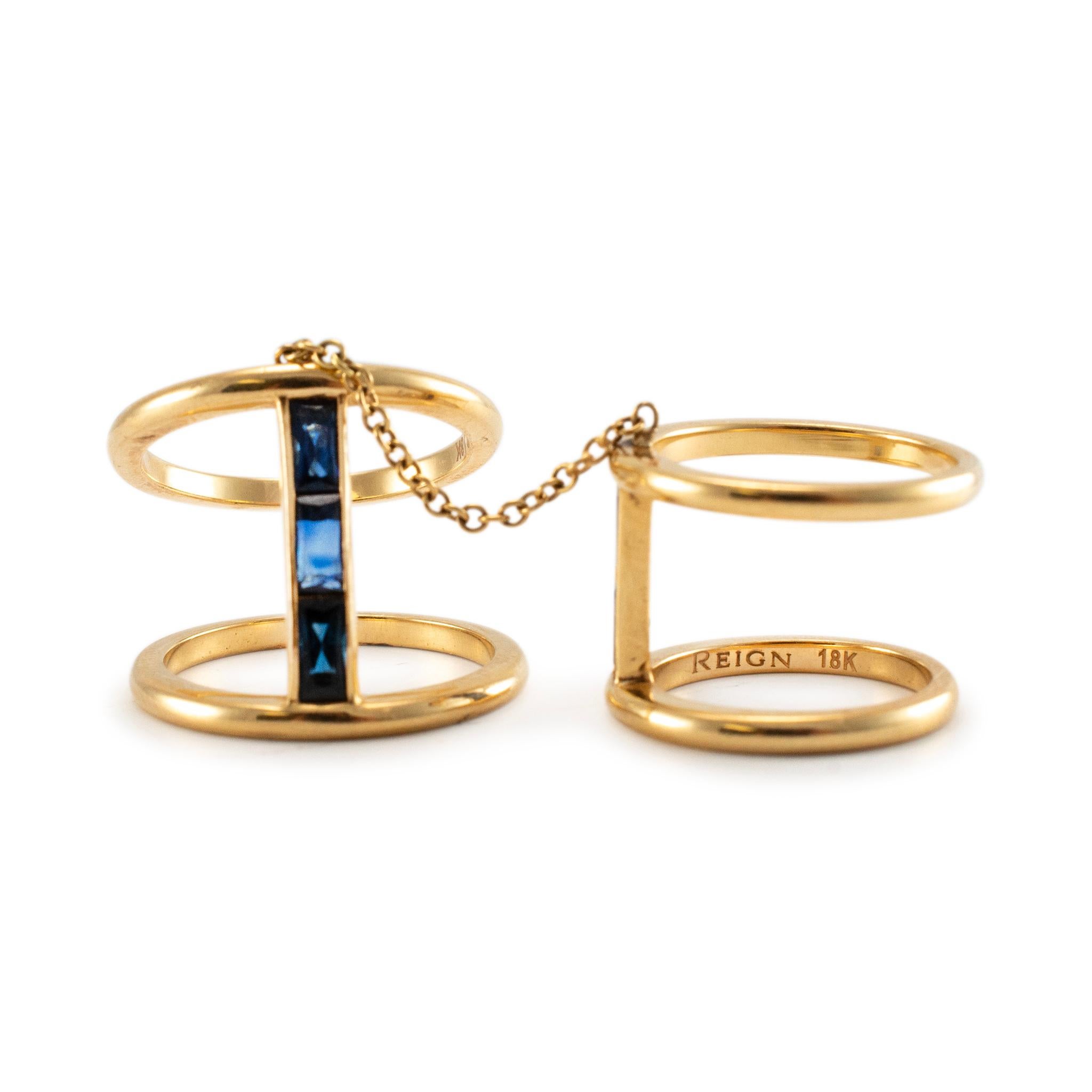 Brand: Reign

Gender: Ladies

Metal Type: 18K Yellow Gold

Ring Size: 5

Large Ring Width Measurement: 18.85 mm 

Small Ring Width Measurement: 14 mm 

Weight: 11.67 grams

Ladies 18K Yellow Gold sapphire stackable cocktail ring with a split-shank.