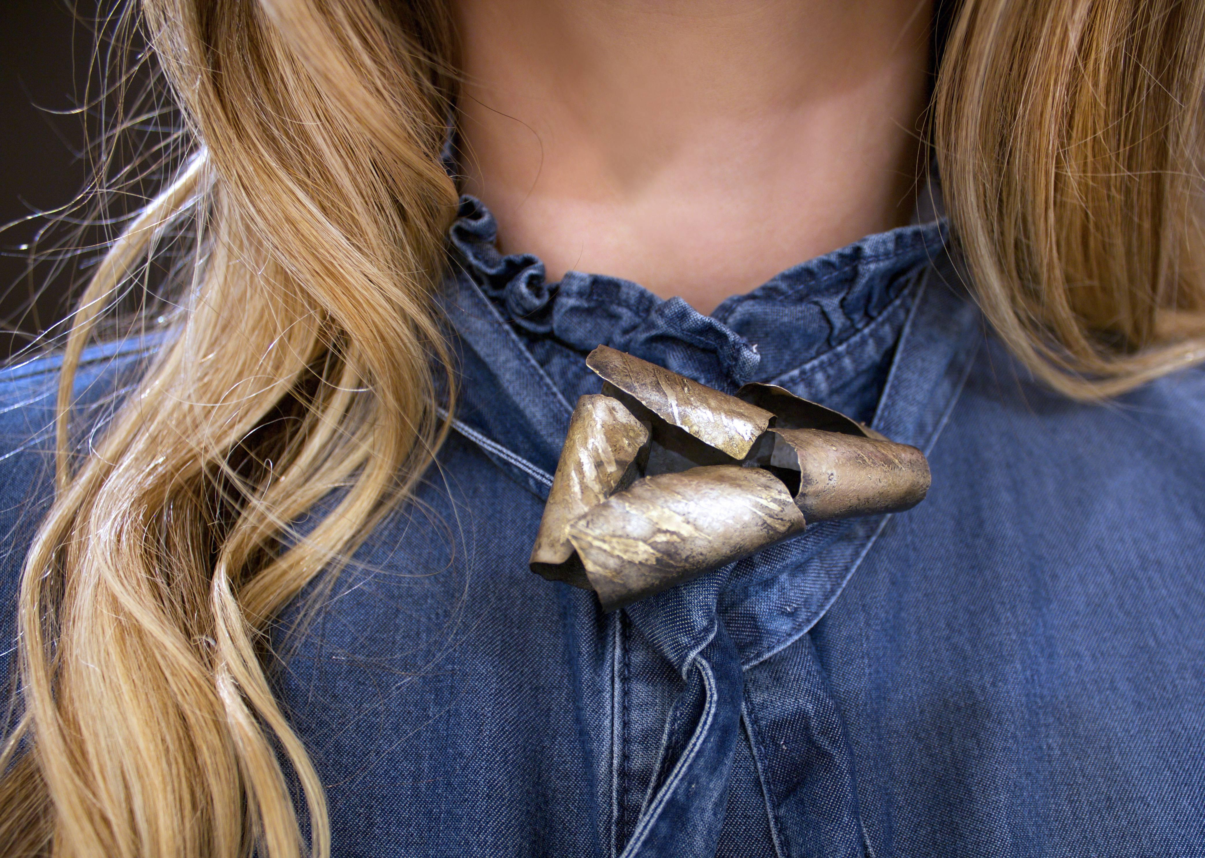 Five Open Cylinder Brooch handcrafted by jewelry artist Reiko Ishiyama in finely-textured sterling silver and 18k gold. 