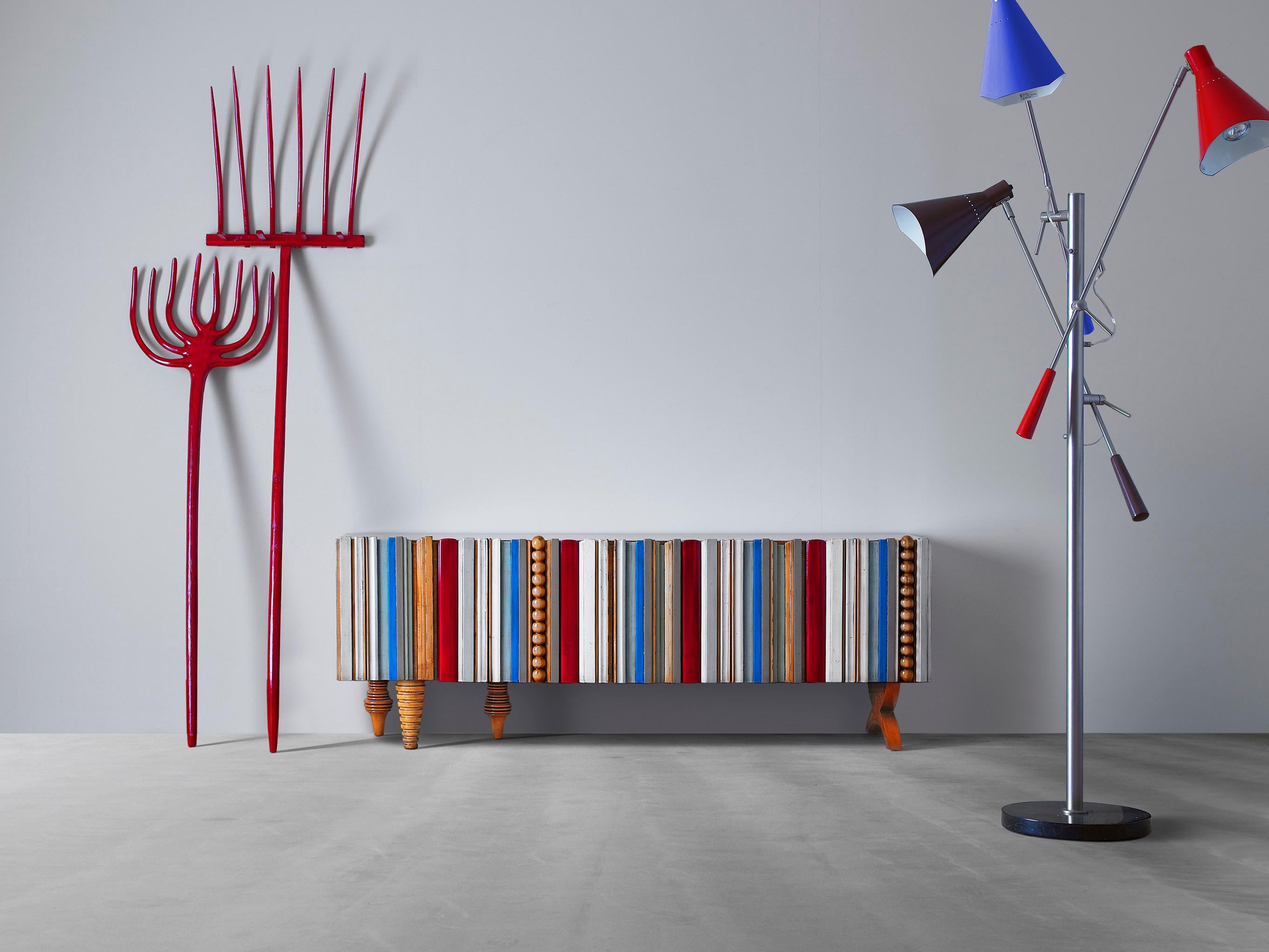 Reina Sideboard 170 by Lola Glamour
Dimensions: D 45 x W 170 x H 60 cm
Materials: Wood.

The Reina series is a contrast of interests, an infinite sum of wooden moldings that make up drawer fronts and doors. The continuous juxtaposition of a series