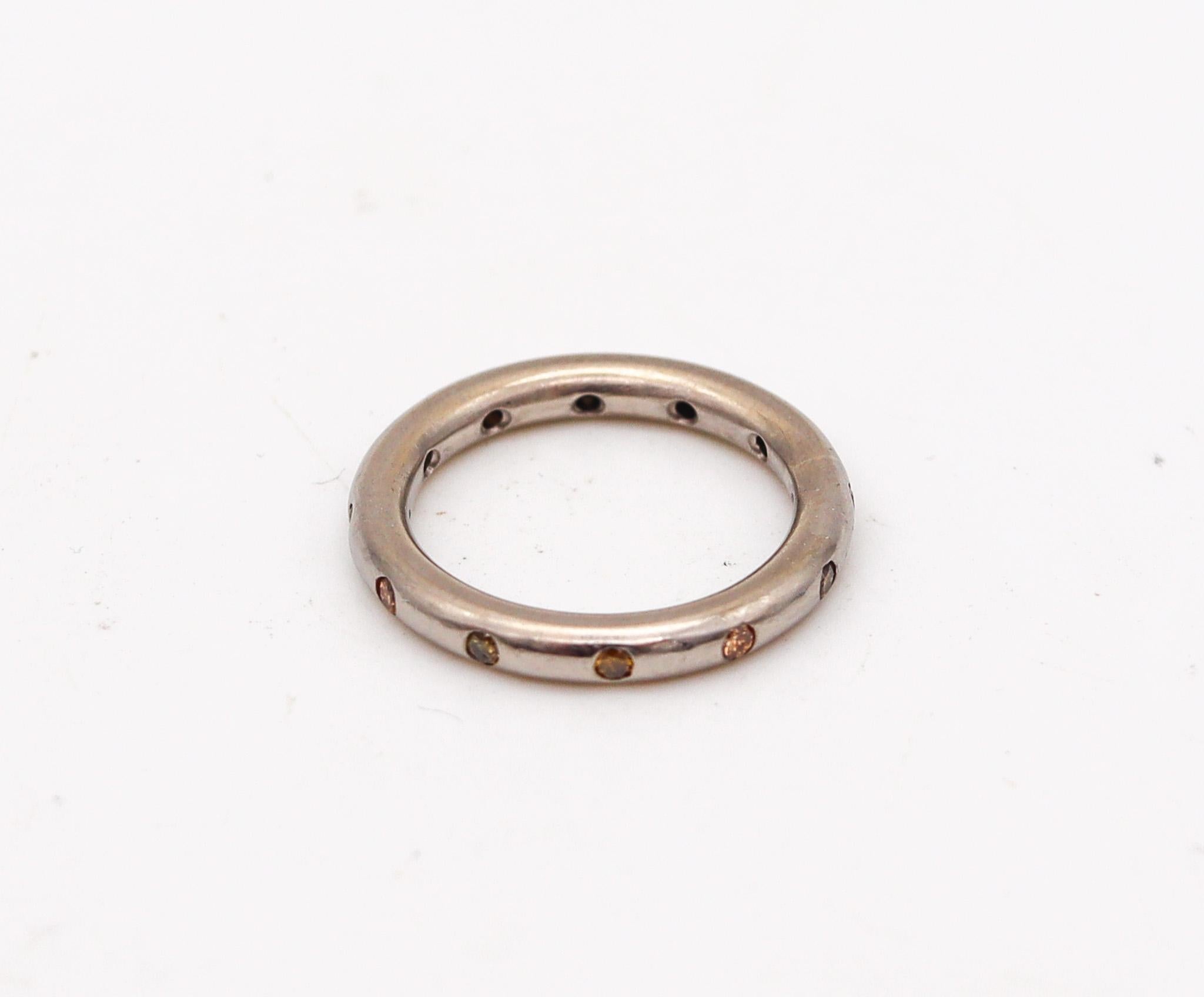 Eternity ring designed by Reinstein-Ross.

Very beautiful eternity ring, created in New York city by the exclusive jewelry designers of Reinstein-Ross. This ring has been crafted in solid white gold of 18 karats (.750/.999 Au) with a delicate thin