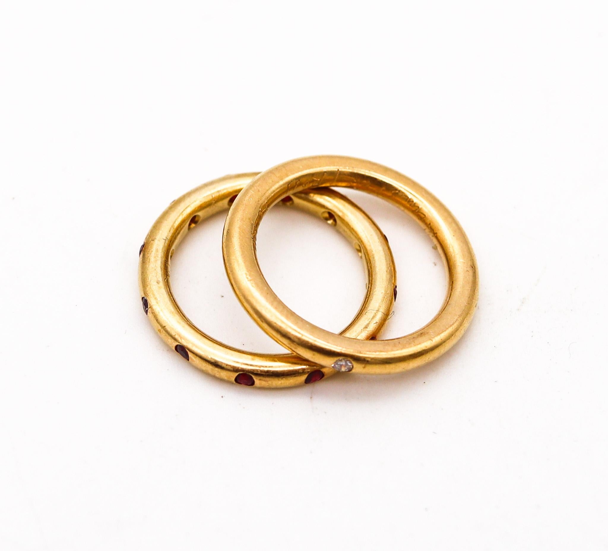 Set of eternity rings designed by Reinstein-Ross.

Very beautiful set of two eternity rings, created in New York city by the exclusive jewelry designers of Reinstein-Ross. This set has been crafted in solid rich yellow gold of 22 karats (.916/.999