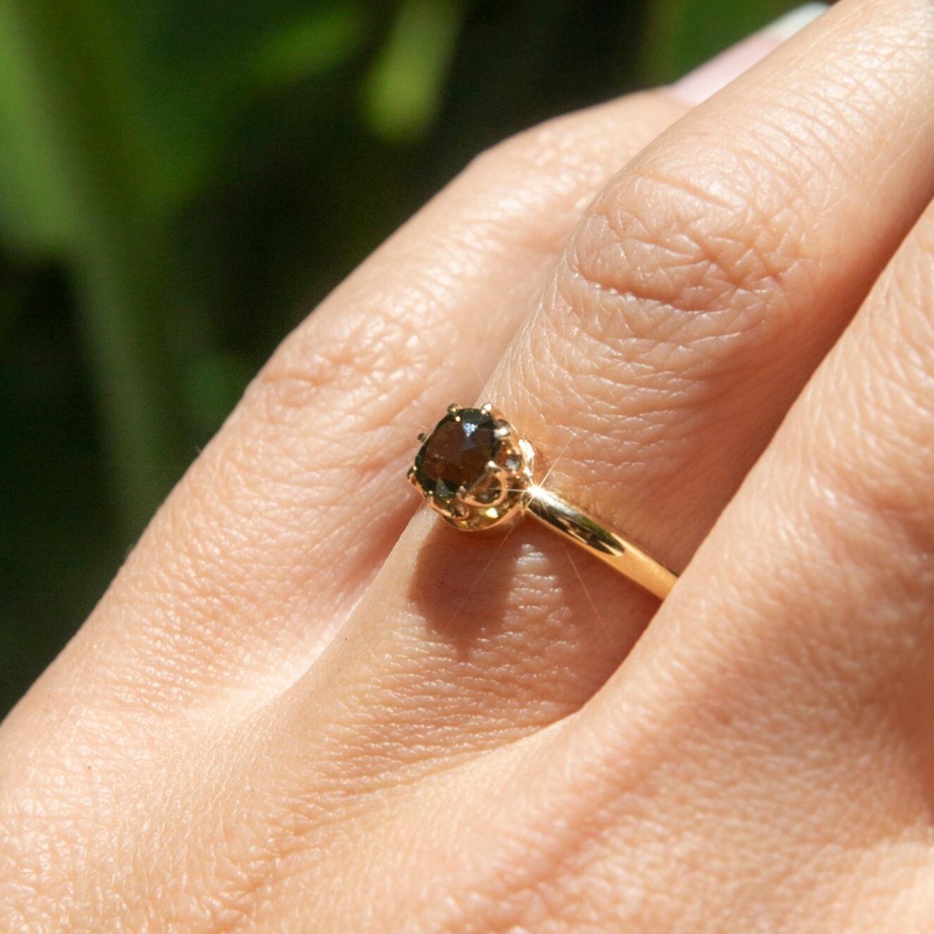 In the simplest of designs we find the sweetest of rewards, Crafted in 18 carat gold, The Artemis Ring is a pure expression of enchantment. Her sumptuous green sapphire rests in a crown that sits atop a band of gold. When you want to whisper 