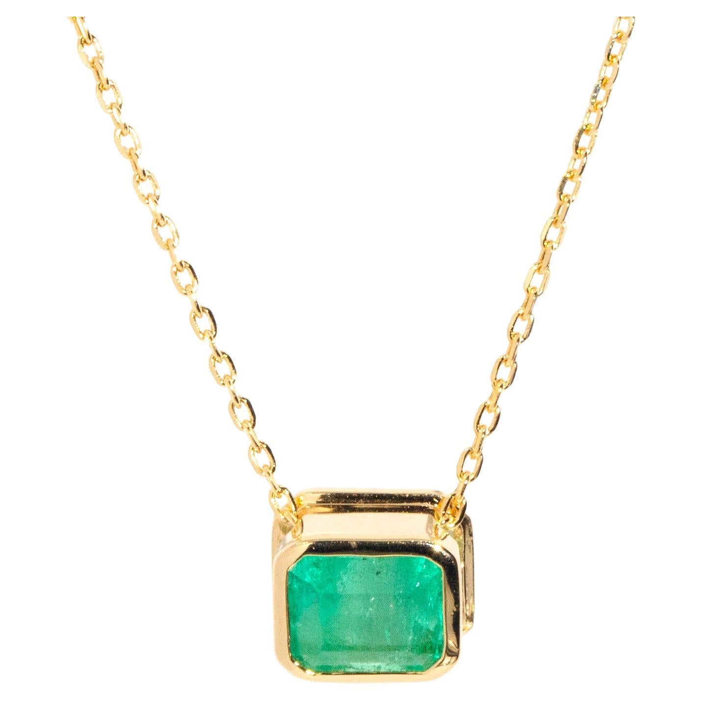 Reinvented 18 Carat Yellow Gold Rubover Emerald Cut Emerald Pendant and