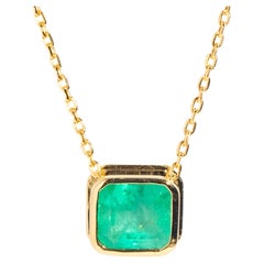 Reinvented 18 Carat Yellow Gold Square Cut Emerald Pendant and Fine Chain