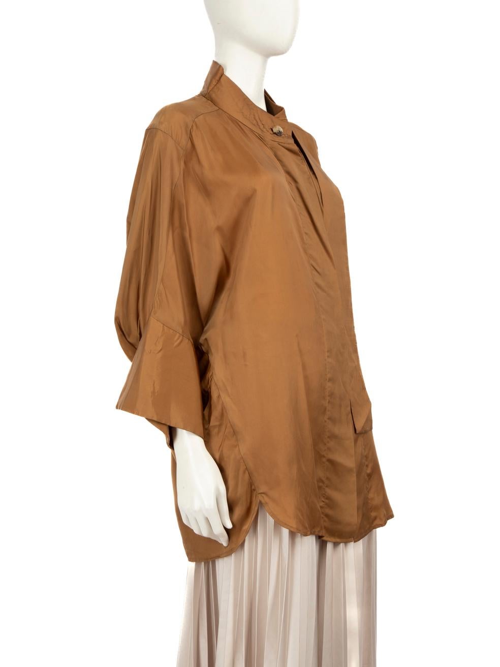 CONDITION is Very good. Minimal wear to top is evident. The bottom button is missing on this used Rejina Pyo designer resale item. Composition and size labels are missing
  
  
  
  Details
  
  
  Brown
  
  Synthetic
  
  Shirt
  
  Long sleeves
 