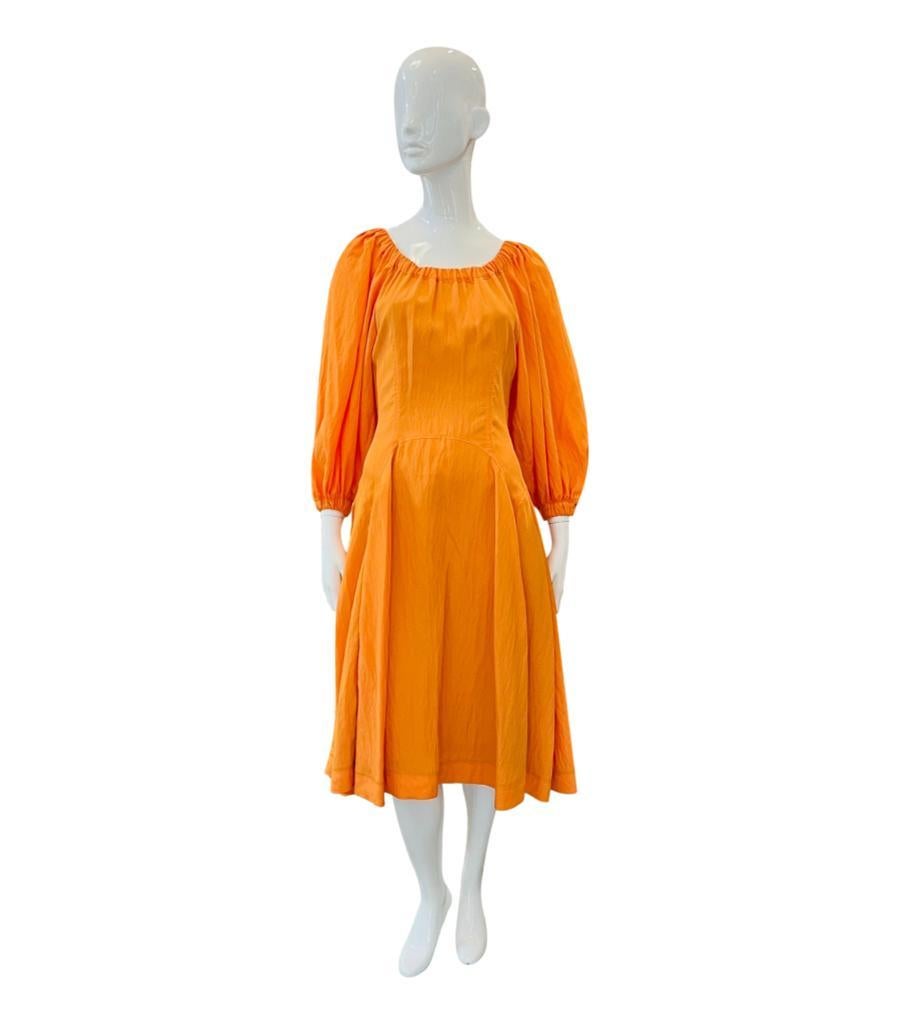 Rejina Pyo Off-Shoulder Dress
Orange midi crinkled-shell dress designed with elasticated neckline that can be worn gathered or off-the-shoulders.
Featuring long puff sleeves and side pockets. Rrp £625
Size – 10UK
Condition – Excellent
Composition –