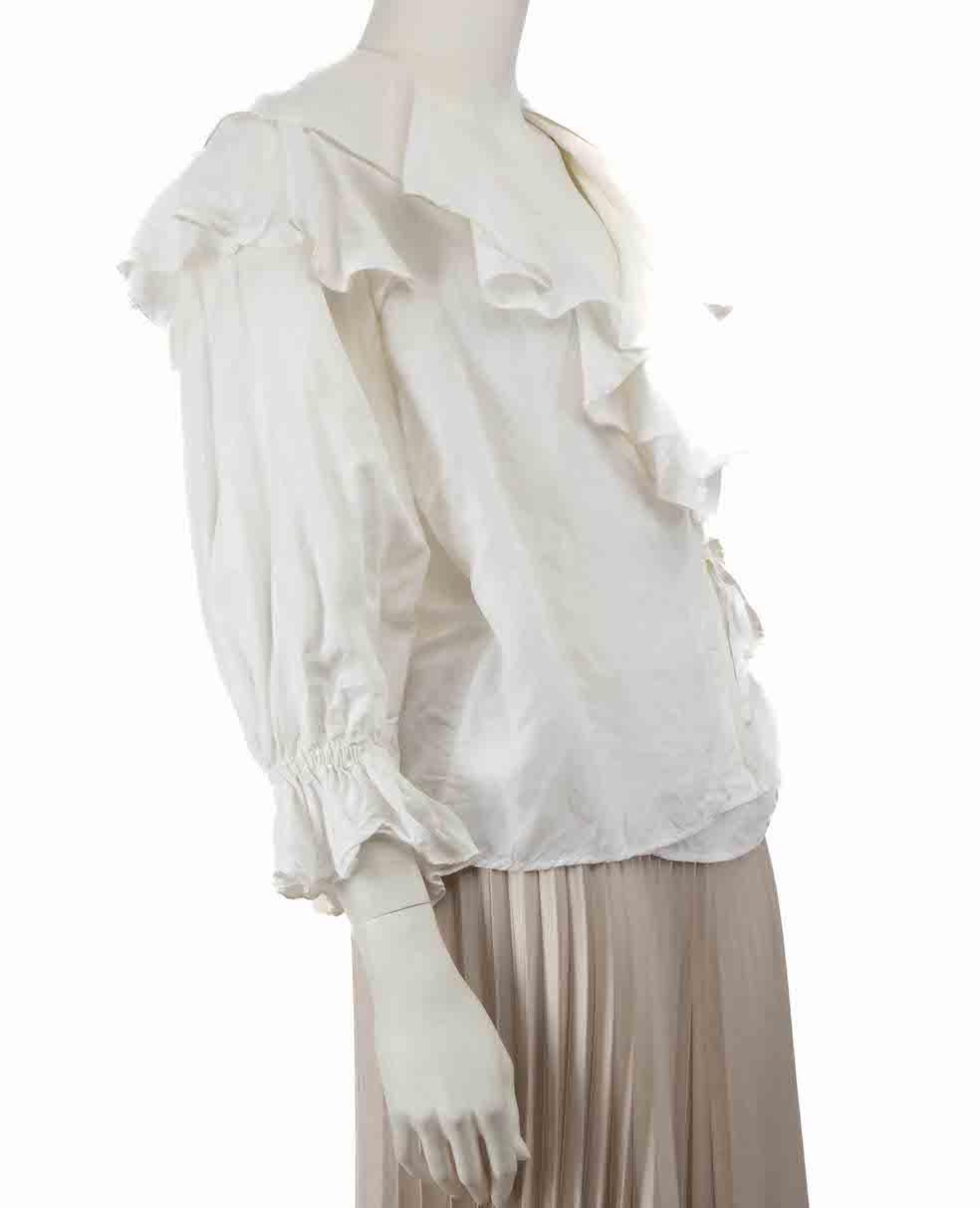 CONDITION is Very good. Minimal wear to blouse is evident. Minimal discolouration to internal neckline and internal underarms. A tiny stain is visible to front hemline on this used Rejina Pyo designer resale item.
 
 Details
 White
 Viscose
 Wrap