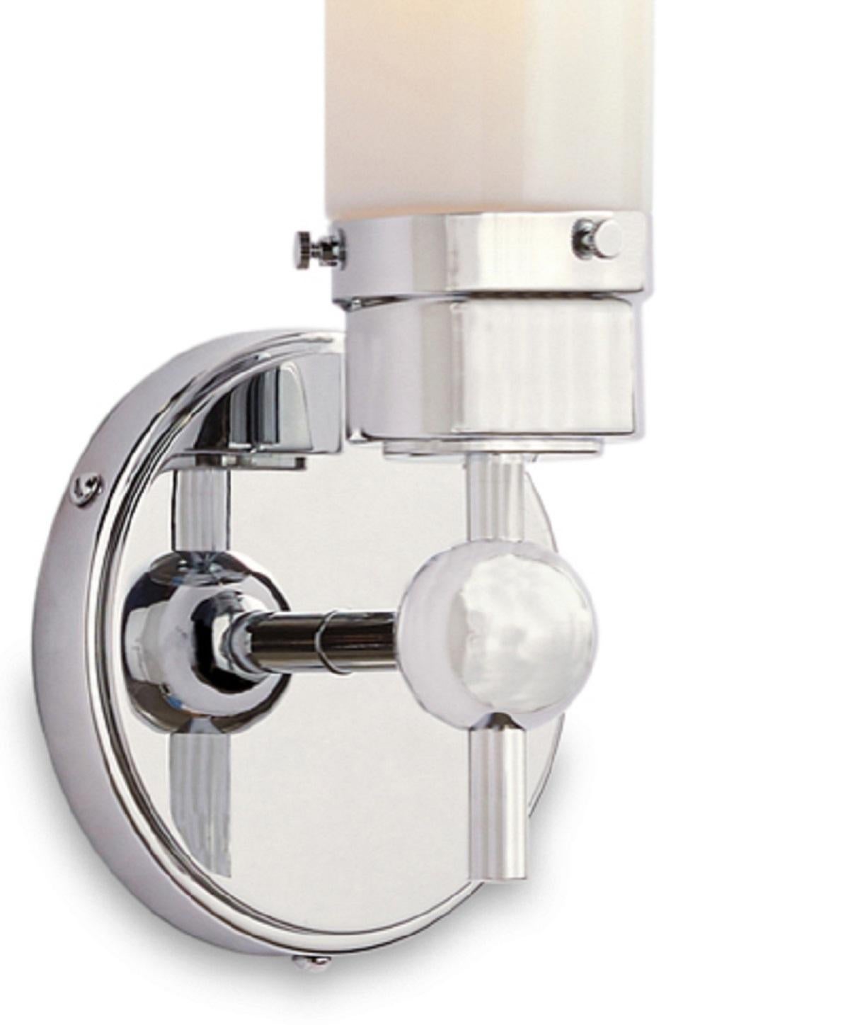 A pair of Howe sconces.

These sconces features a modern silhouette, steel construction, and a unique spherical detail inspired by 1950s Swedish designs. Usable indoors or out for a timeless update that will last.

Dimensions: 5”L x 5”W x