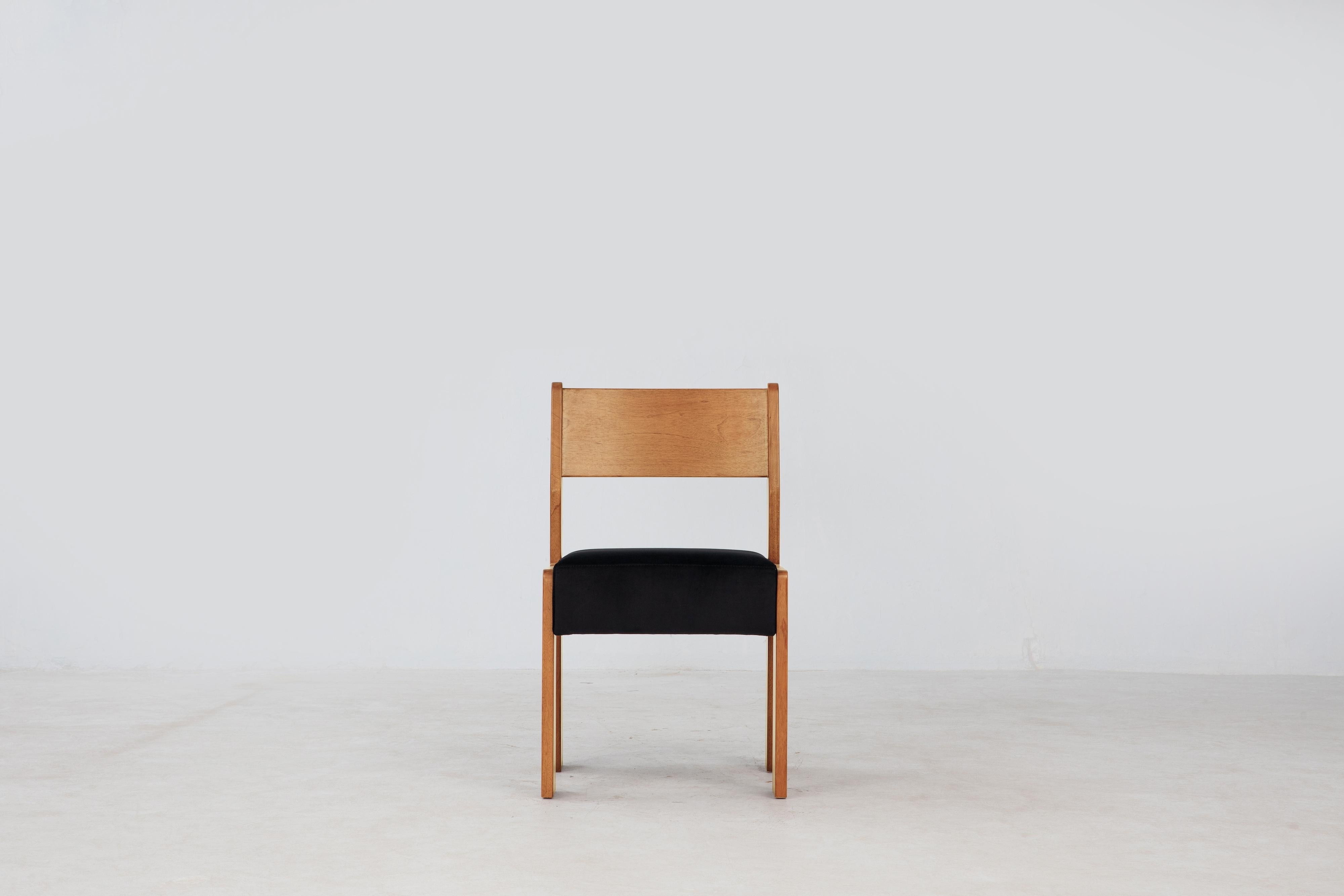 The Reka Side Chair spotlights contrasting width. In designing the chair, we played with wide and narrow, thick and thin: the legs are wide and flat along one axis, thin along the other, while the seat cushion was elongated and fattened vertically.