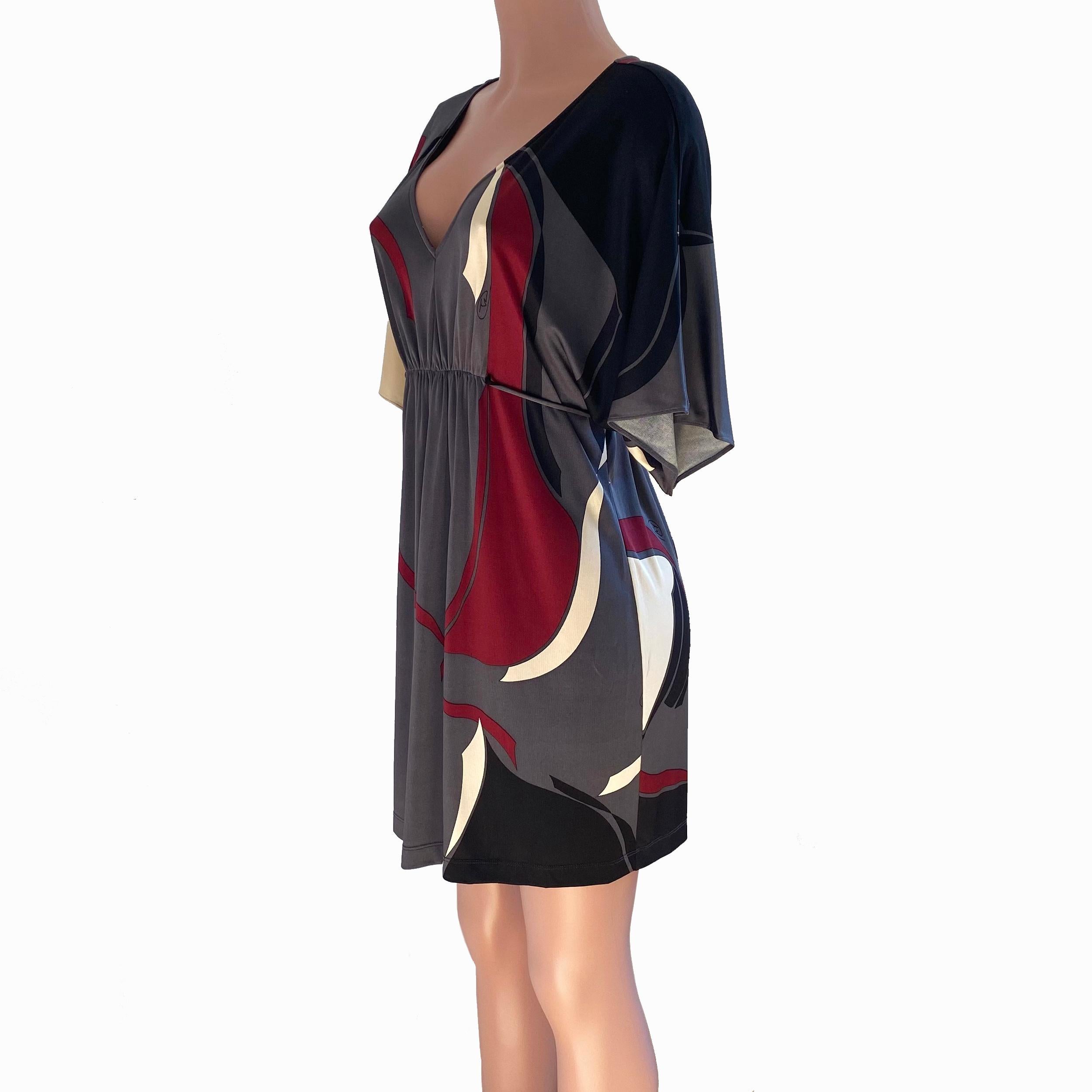 Deep V-neck easy cool silk jersey caftan 
Original colorblocked ribbon print from Flora Kung.
Can be tied at front or back, dressed up or down as a dress or with jeans/leggings. 
US 6 = UK 10 = French 38
Approximately 34
