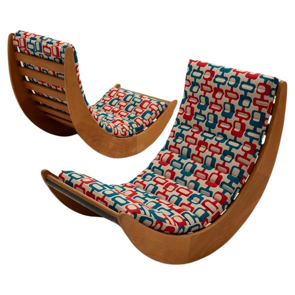 The Relaxer by Verner Panton is an iconic and innovative piece of furniture that epitomizes mid-century modern design with a playful twist. These lounge chairs feature a unique rocking base crafted from high-quality wood, providing both stability