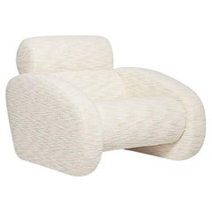 Relaxing Bouclé Armchair with Curvy Silhouette