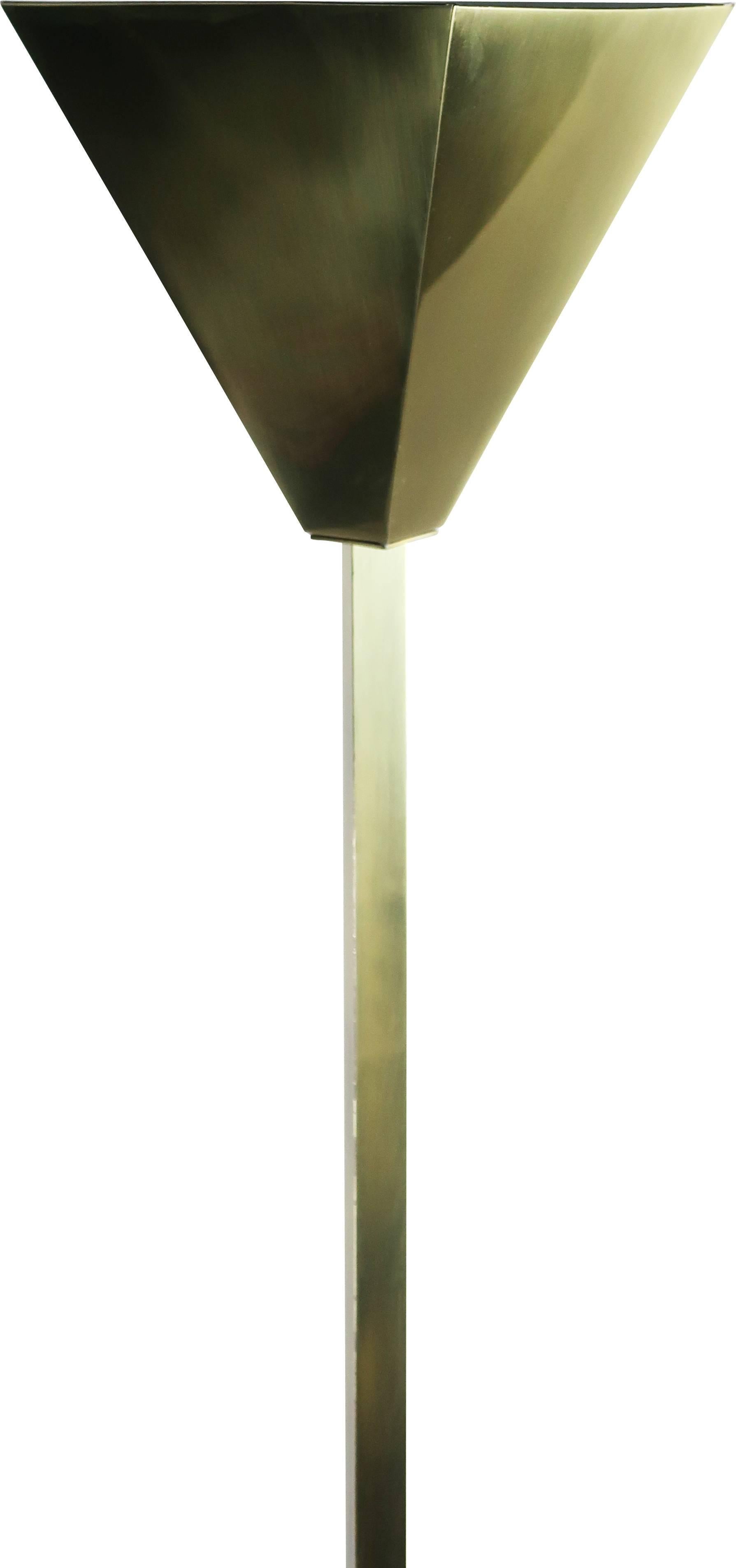 A gorgeous example of the glamour of 1980s Italian modern from Relco Milano. An elegant brass torchiere floor lamp with dimming factory Relco power pack, this piece has a square base, square stem, and angled shade that provides exactly as much up