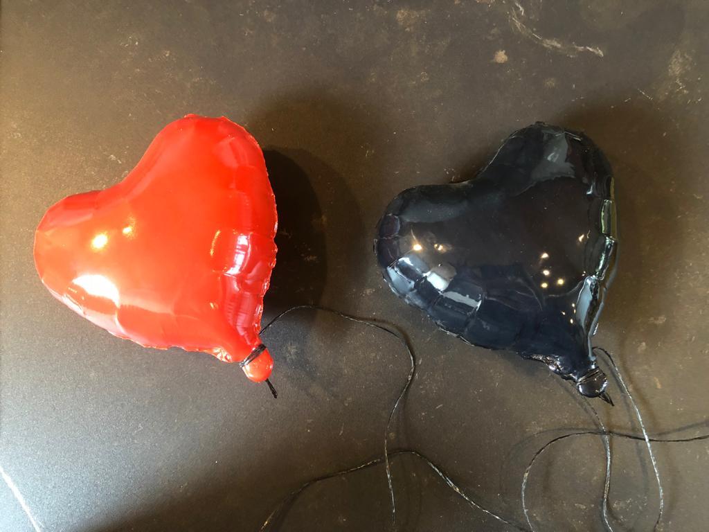 Black glossy ceramic heart balloon sculpture handmade for wall installation - Contemporary Sculpture by Reli Smith and Osnat Yaffe Zimmerman