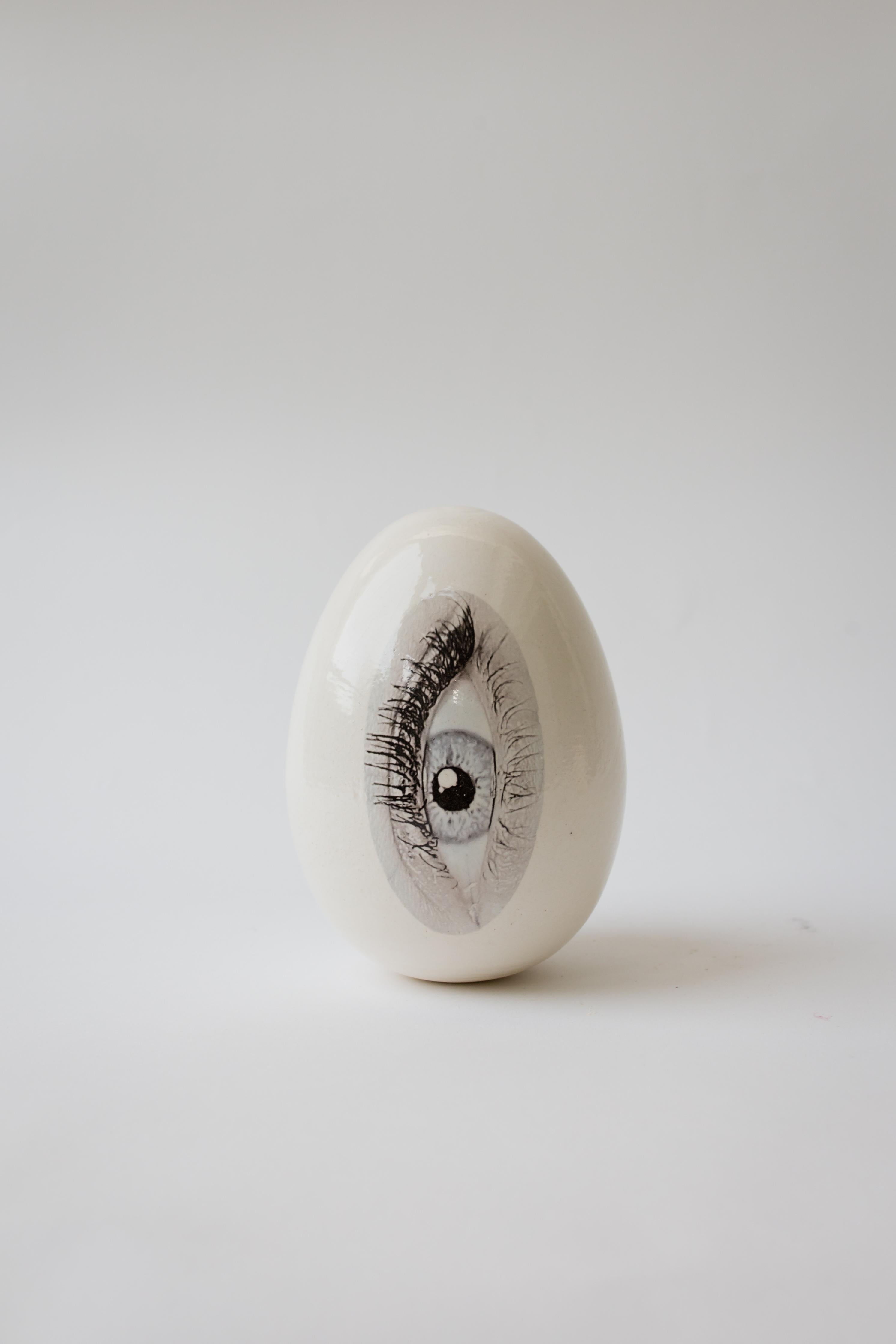 Good eye ceramic egg sculpture for home, office decor, collector piece.
handmade in the picturesque village Arsuf in Israel is an art piece for designers and architects as well as home owners.
Harmony and grandeur characterize the work of Reli Smith
