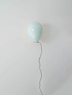 Light blue glossy ceramic balloon sculpture handmade for wall