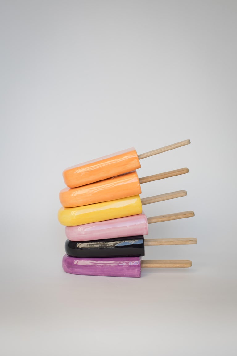 Glossy ceramic popsicle sculpture handmade for wall installation. Available at Variant colorful glaze.

Harmony and grandeur characterize the work of Reli Smith and Osnat Yaffe Zimmerman in their artistic cooperation under the brand R+O Design. The