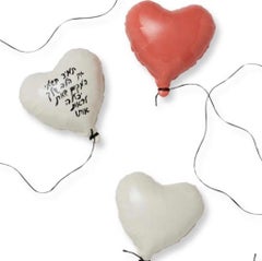 Red glossy ceramic heart balloon sculpture handmade for wall installation
