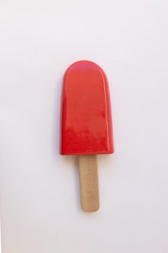 Red glossy ceramic popsicle