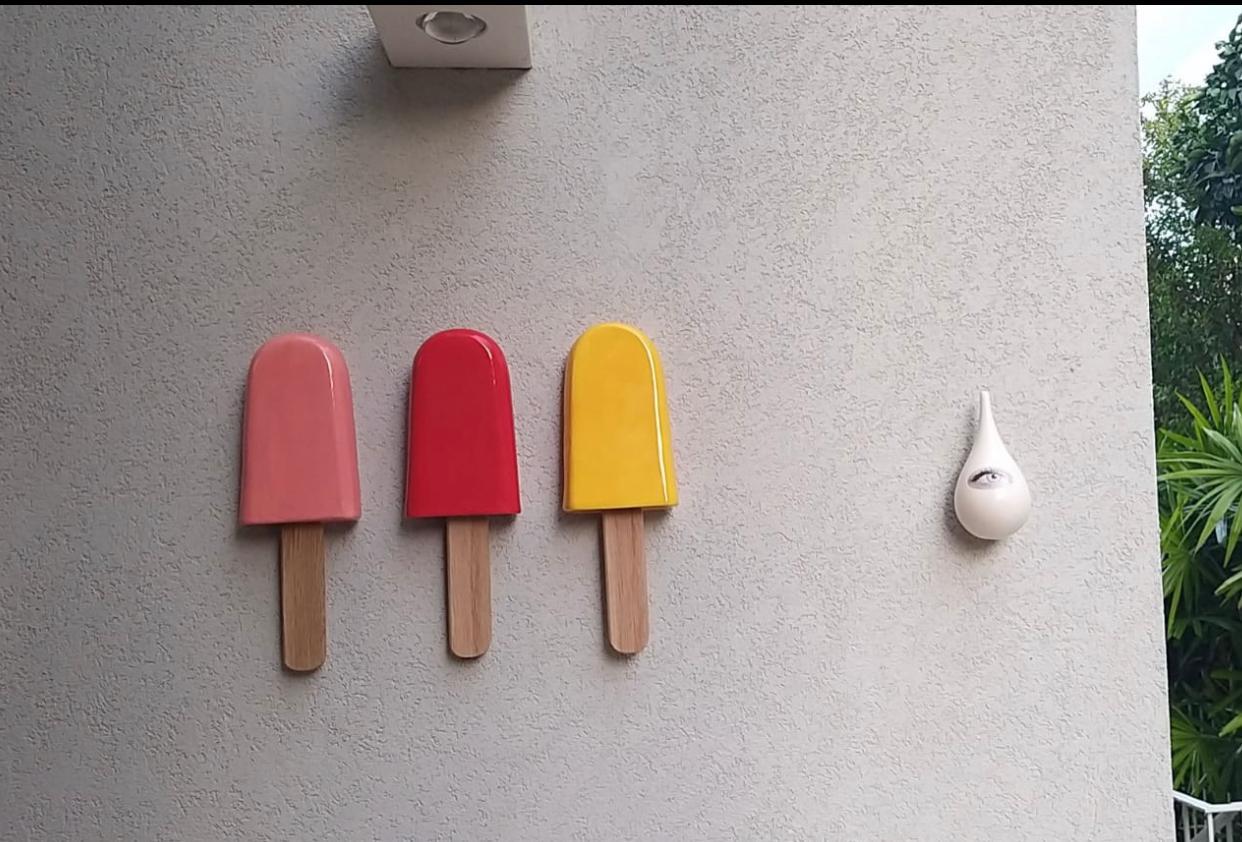 Set of 12 glossy ceramic popsicles wall hanging - Sculpture by Reli Smith and Osnat Yaffe Zimmerman