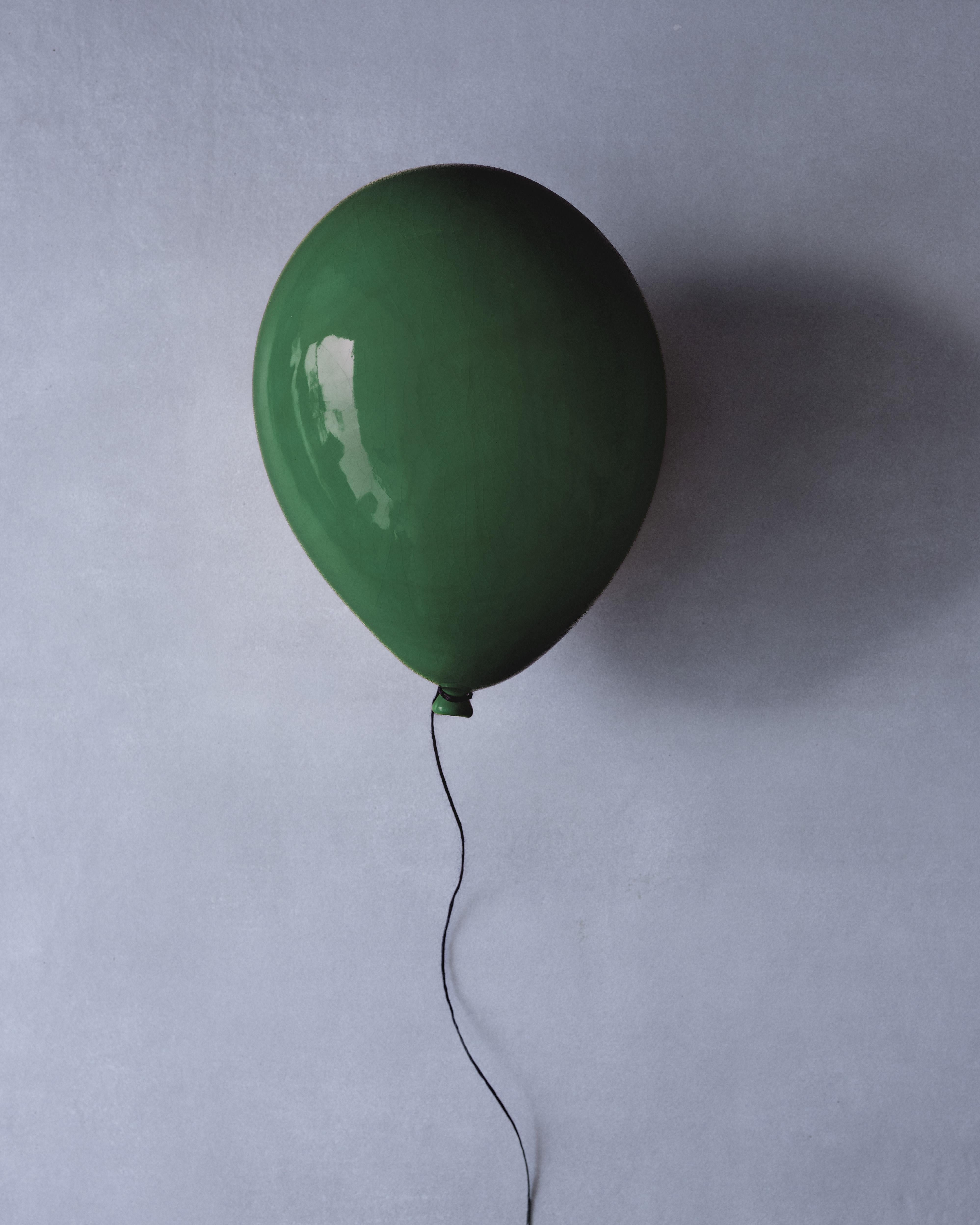 This aubergine glossy ceramic balloon sculpture is a balloon for life and an art collectors piece. Its Vivid glossy color enhances sophisticated and cheerful space environment.
handmade in the picturesque village Arsuf in Israel the balloon creates