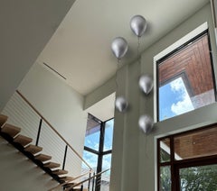 Set of 5 Silver ceramic balloon sculptures handmade for wall installation.