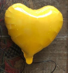 Yellow glossy ceramic heart balloon sculpture handmade for wall installation