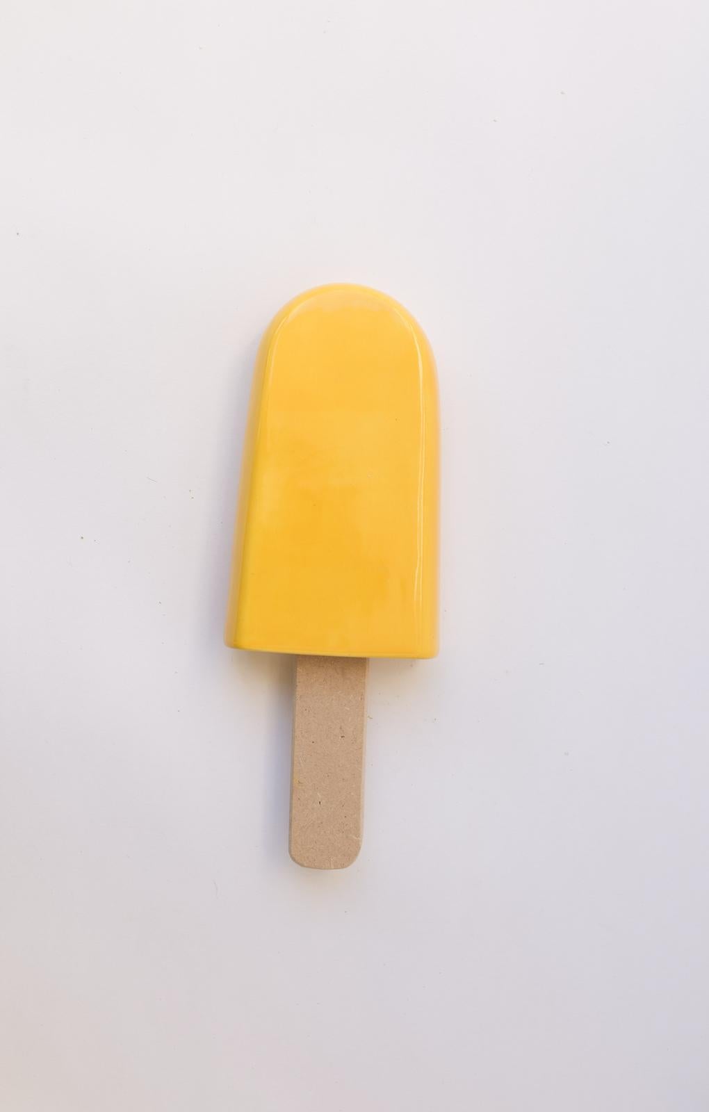 Yellow glossy ceramic popsicle - Sculpture by Reli Smith and Osnat Yaffe Zimmerman