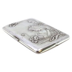 Relief silver case with young lady in Art Nouveau style, gold interior