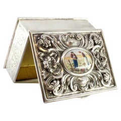 Relief silver jewelry box with wreaths and praying couple on enamel