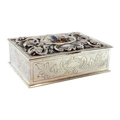Relief silver jewelry box with wreaths and praying couple on enamel