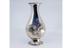 Relief silver vase in Art Nouveau style, resting on an oval base