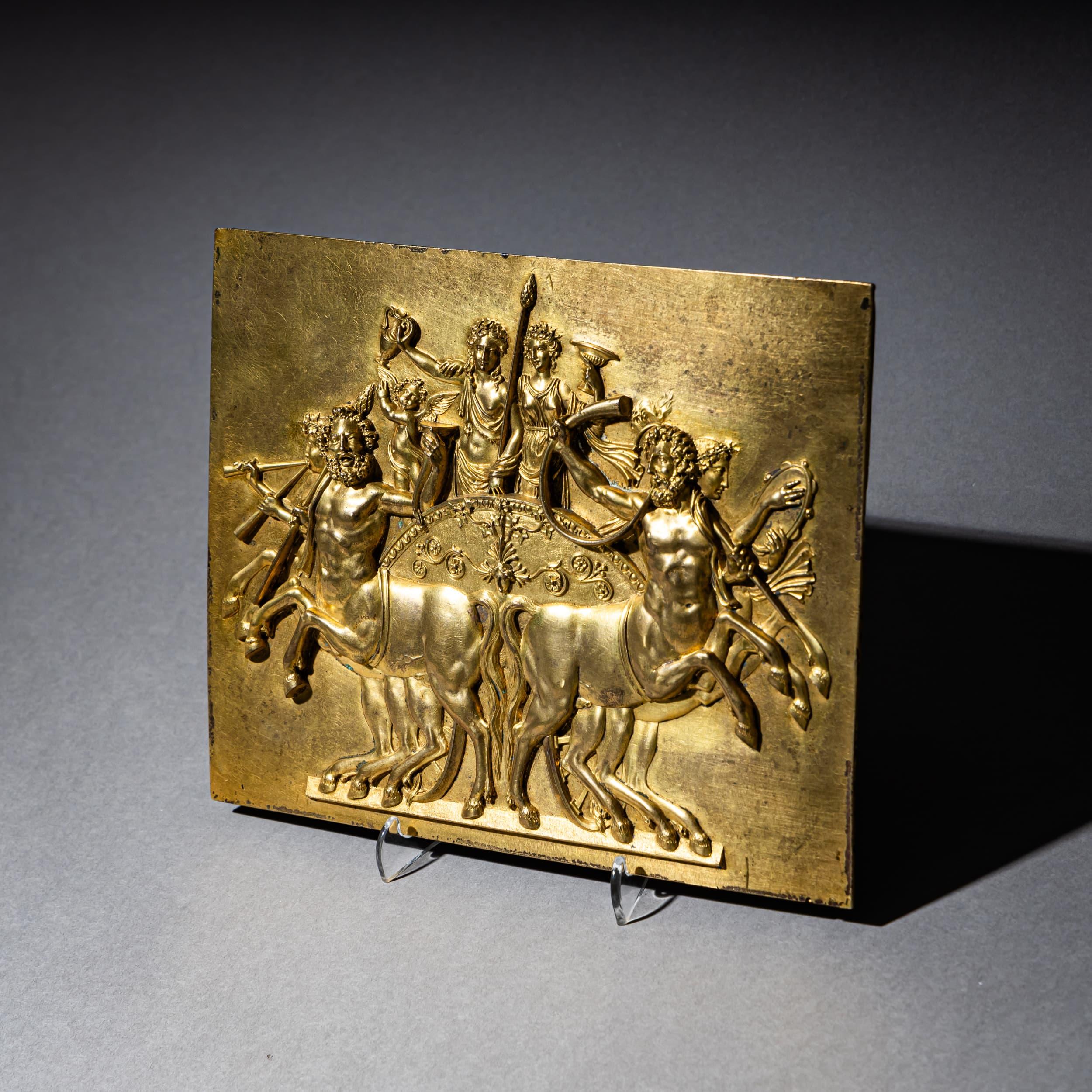 Gilt bronze relief depicting the “Triumph of Bacchus,” created in France during the first quarter of the 19th century. The composition is based on the famous ancient cameo Triumph of Bacchus, discovered in 1661 during excavations along the Via