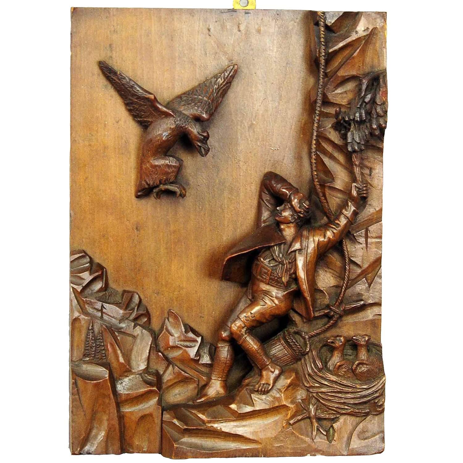 Relief wood carving nest Robber, black forest ca. 1890

A fine wood carving relief depicting a scenery of a nest robbing of a raptor by a man. The model for this carving was painted by Josef Anton Strassgschwandtner (1826-1881) and is titled