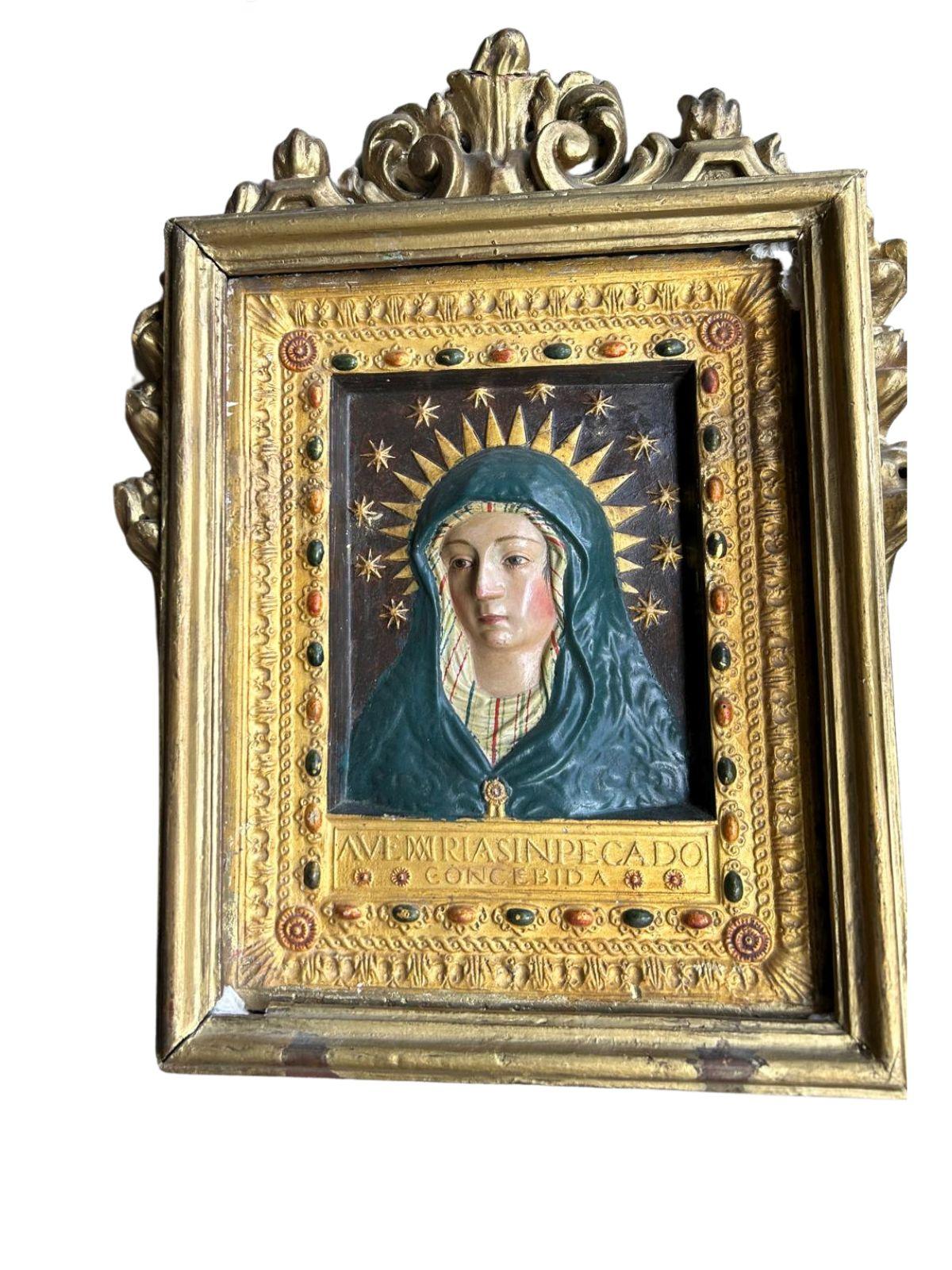 Polychromed and Gilded Plaster
Carved and Gilded Frame in the Baroque Style
Hispanic World 18th-19th Century

This beautiful bust figure of the Virgin Mary is carved in relief on live plaster, painted in oil, and polychromed with rays and stars.
At