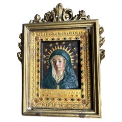 Soulagez la Vierge Marie. Cadre sculpté et doré de style baroque