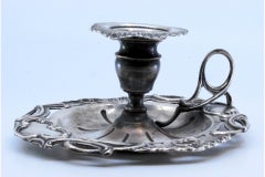 Reliefiertes Silberpaddel mit Muschelform